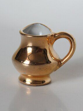 Miniature Golden Pitcher with Perpendicular Handle